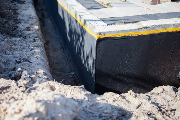 Professional Waterproofing technician working in Newburg, WI